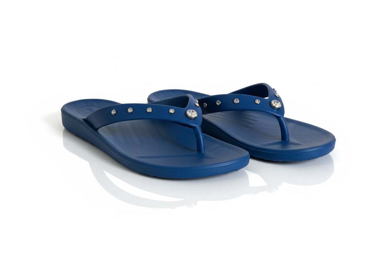 Close-up of FLOPEDS Princess III royal blue strap detail and cushioned footbed texture
