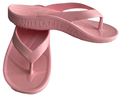 A pair of baby pink FLOPEDS T3 flip flops with high arch support and deep heel cup.